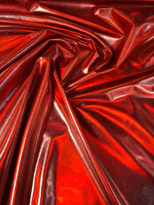 New iridescent red all over foil metallic nylon spandex 4way stretch 58/60" Sold bu the YD. Ships worldwide from Los Angeles California USA