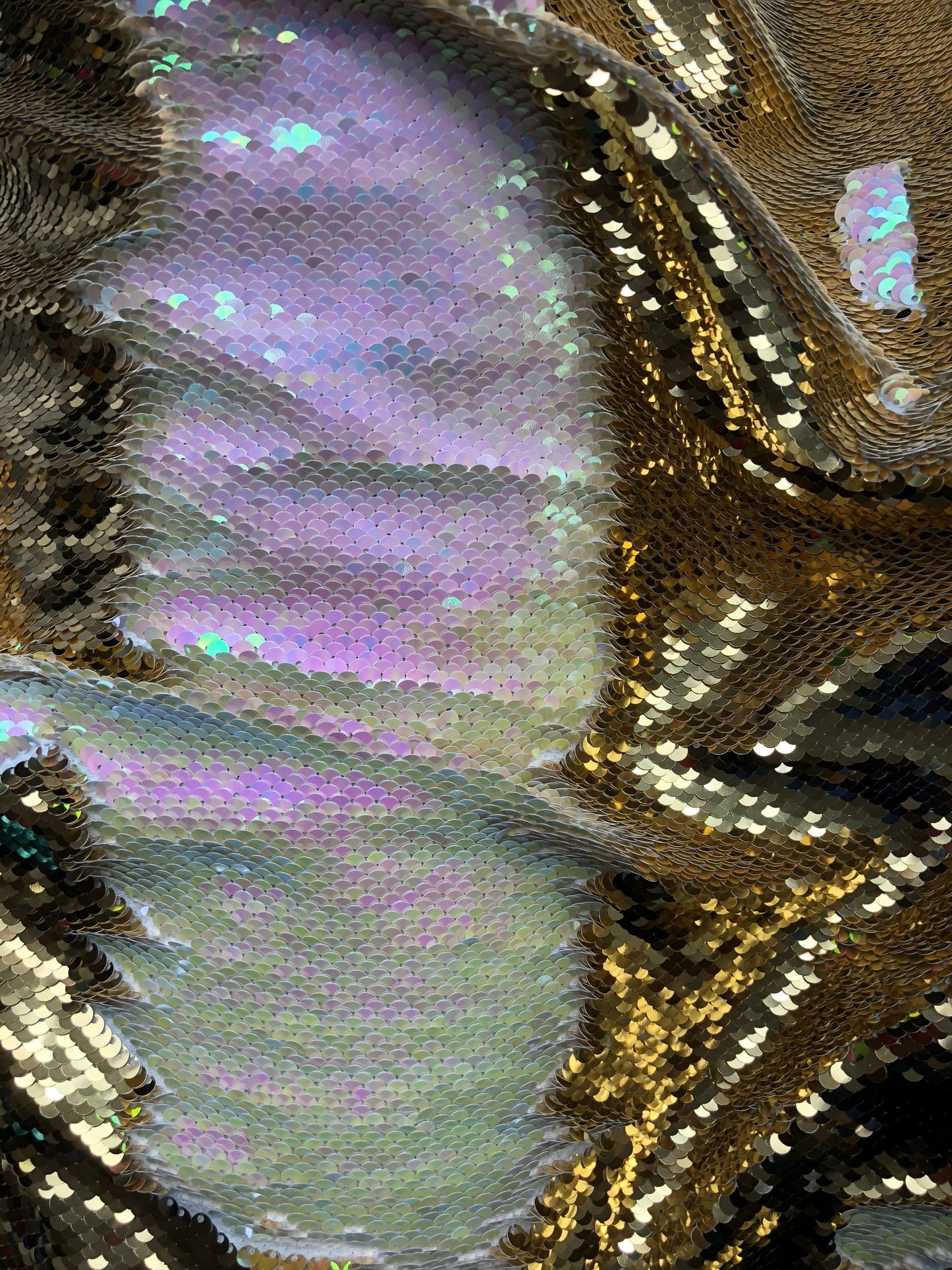 New flip up sequins gold/ilusión reversible sequins on spandex base 2 way stretch 58/60" Sold by the YD. Ships worldwide from Los Angeles CA