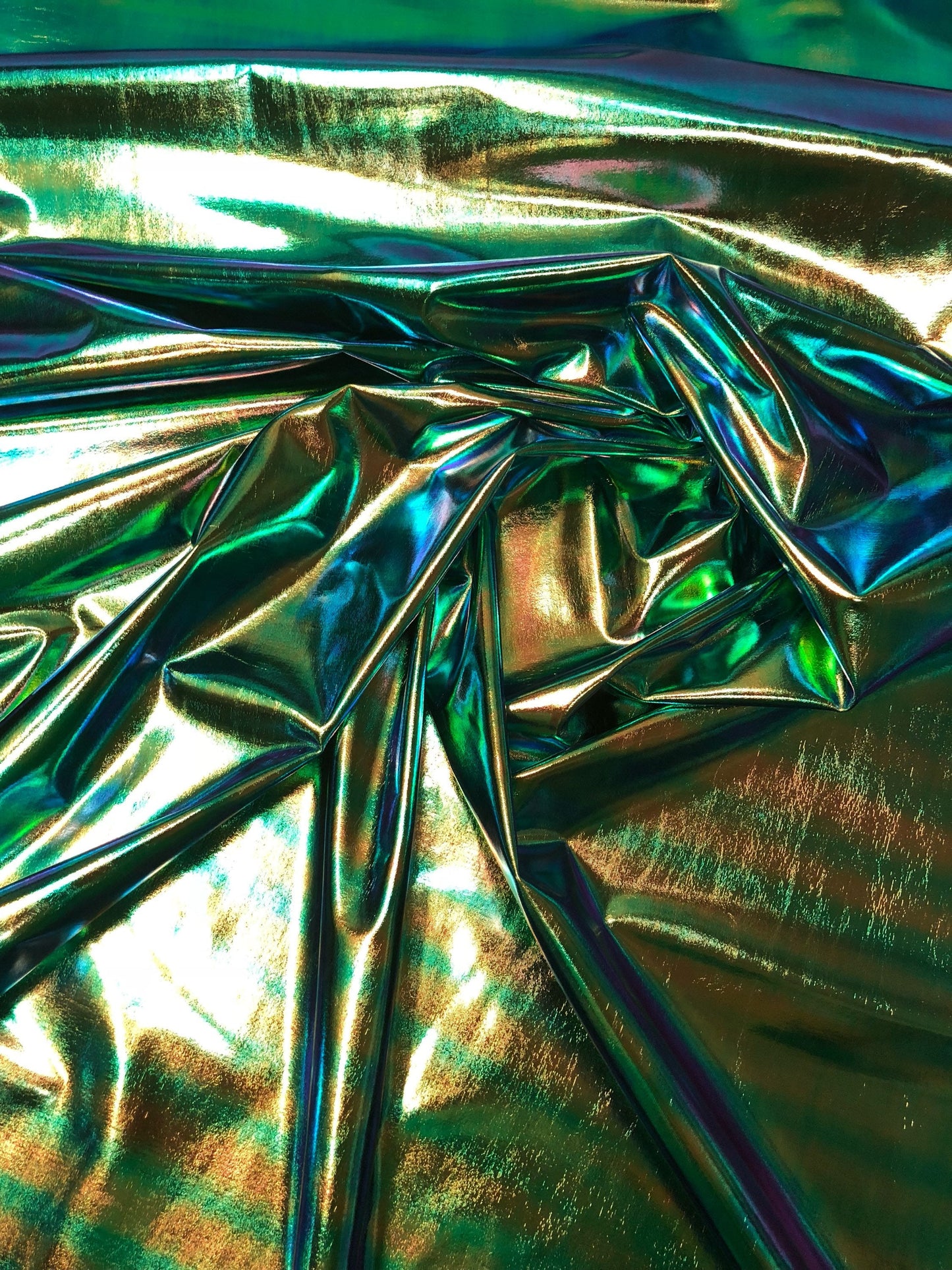 New iridescent foil blue/green all over foil 4way Stretch 58/60" Sold bybthe YD. Ships worldwide from Los Angeles California USA.