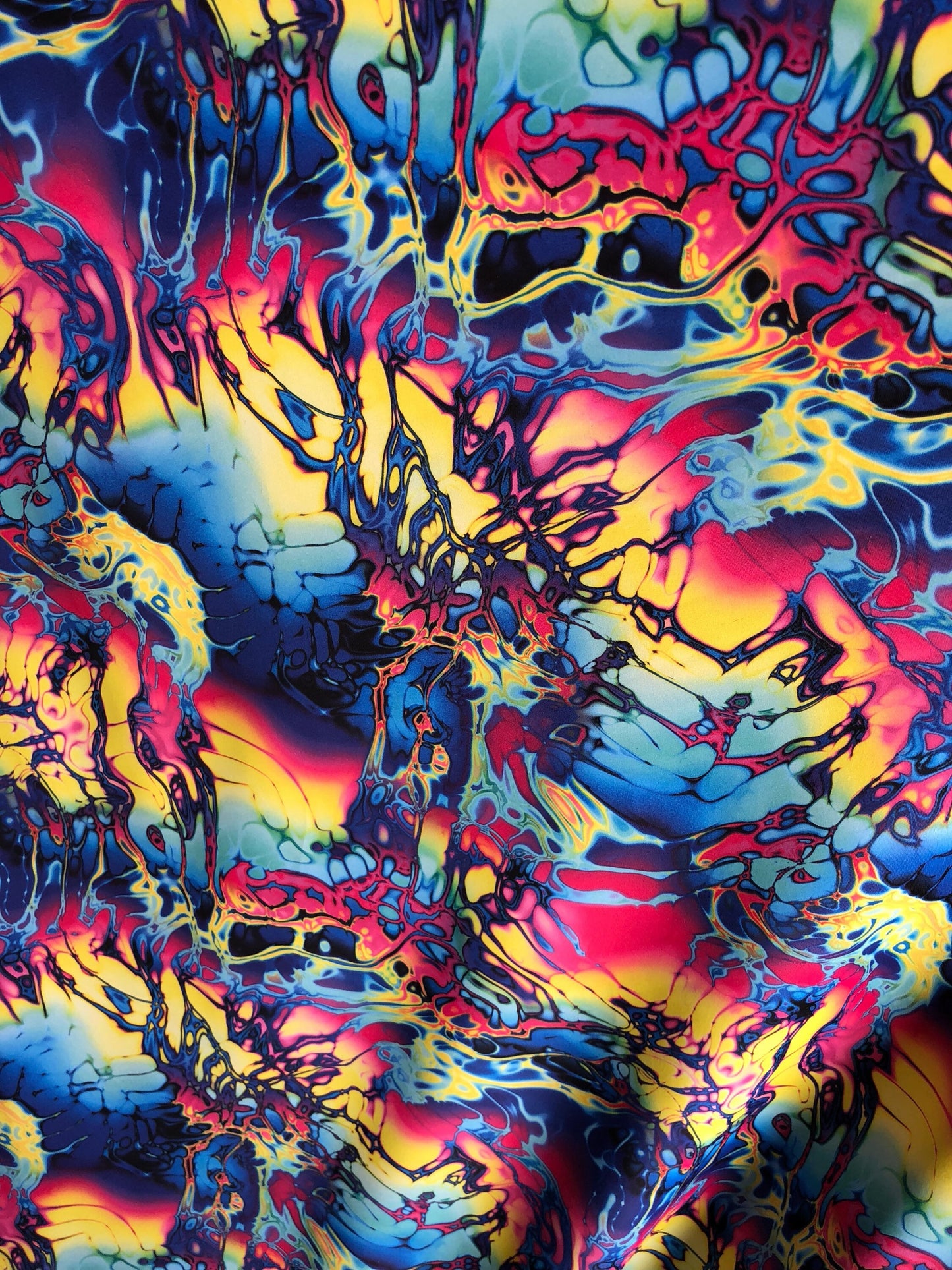 New abstract design print on nylon spandex 4way Stretch 58/60" Sold by the YD. Ships worldwide from Los Angeles California USA.