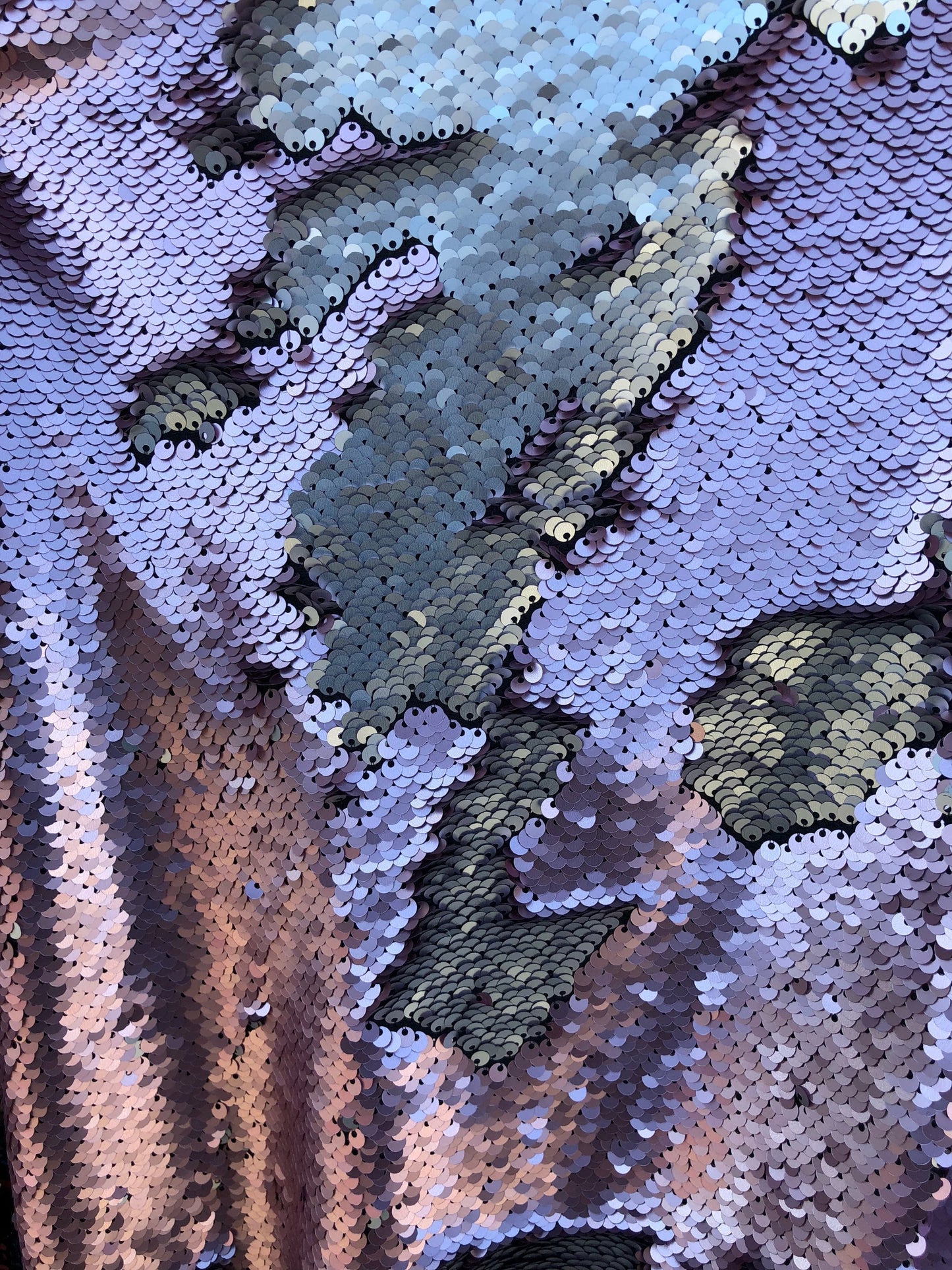 Flip up sequins reversible sequins 2 tone  it comes on spandex base 2way Stretch 58/60" Sold by the YD. Ships worldwide from Los Ángeles CA