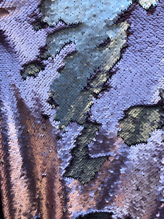 Flip up sequins reversible sequins 2 tone  it comes on spandex base 2way Stretch 58/60" Sold by the YD. Ships worldwide from Los Ángeles CA