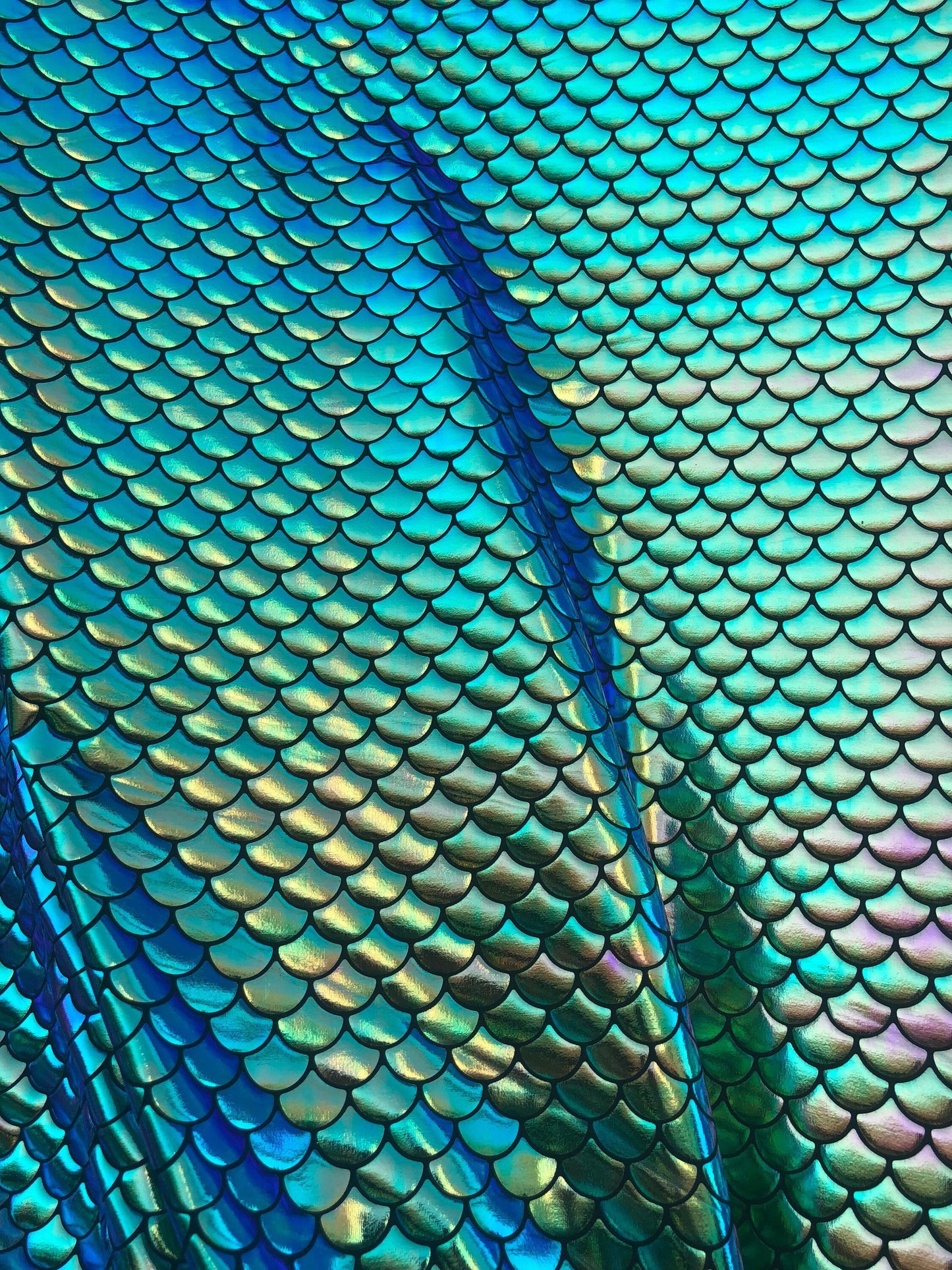 Mermaid design fish scael green with blue turquoise effect Nylon 4way Stretch 58/60" Sold by the YD. Ships worldwide from Los Angeles CA USA