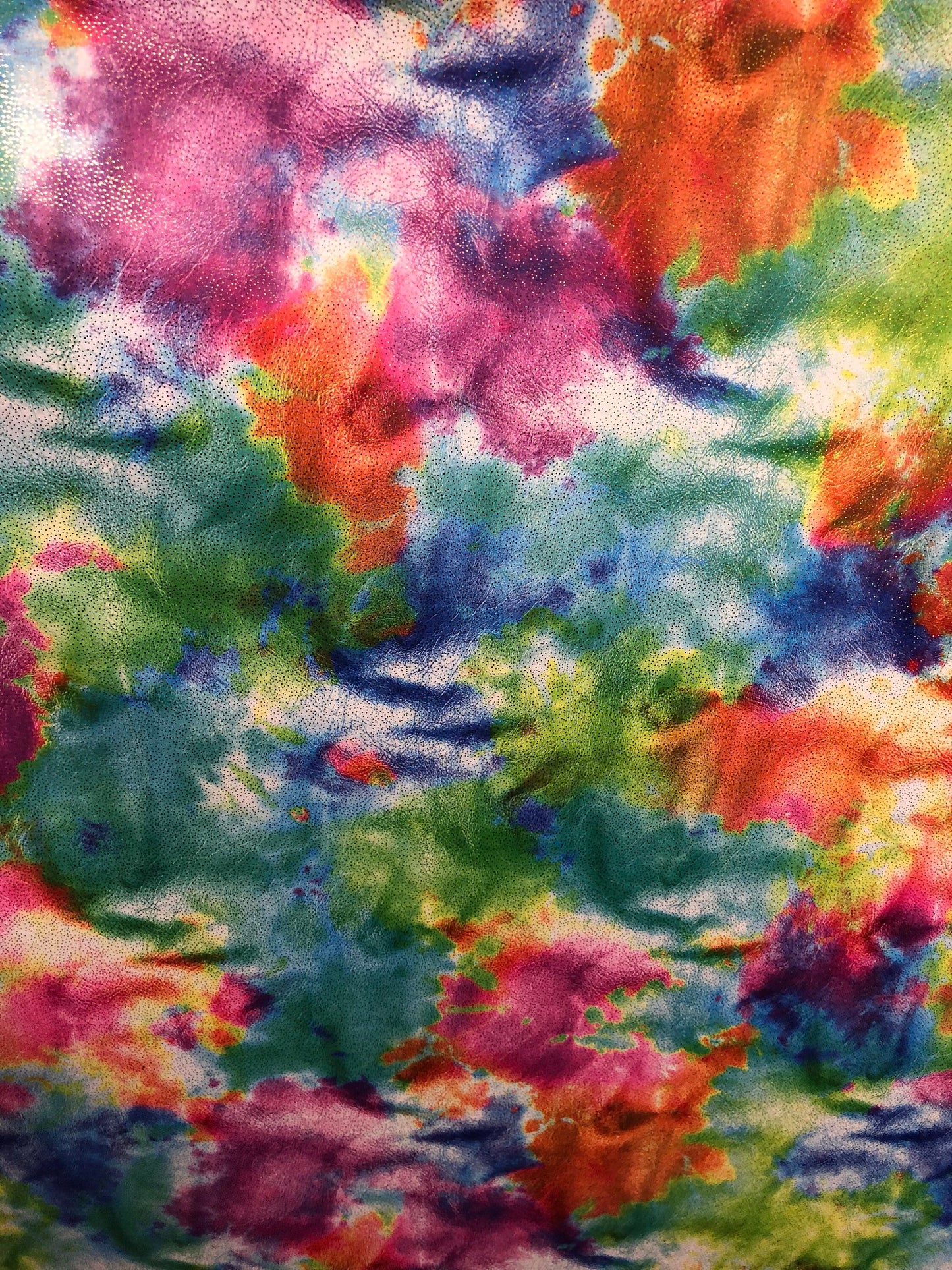 New tie dye nylon spandex with foil all over 4way Stretch 58/60" Sold by the YD. Ships worldwide from Los Angeles California USA.
