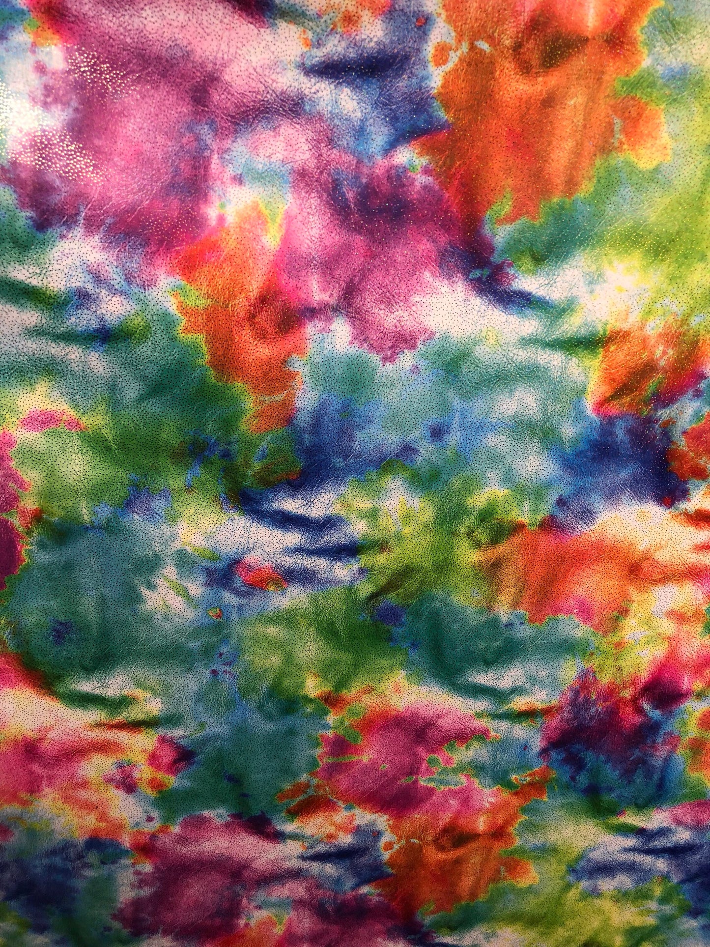 New tie dye nylon spandex with foil all over 4way Stretch 58/60" Sold by the YD. Ships worldwide from Los Angeles California USA.