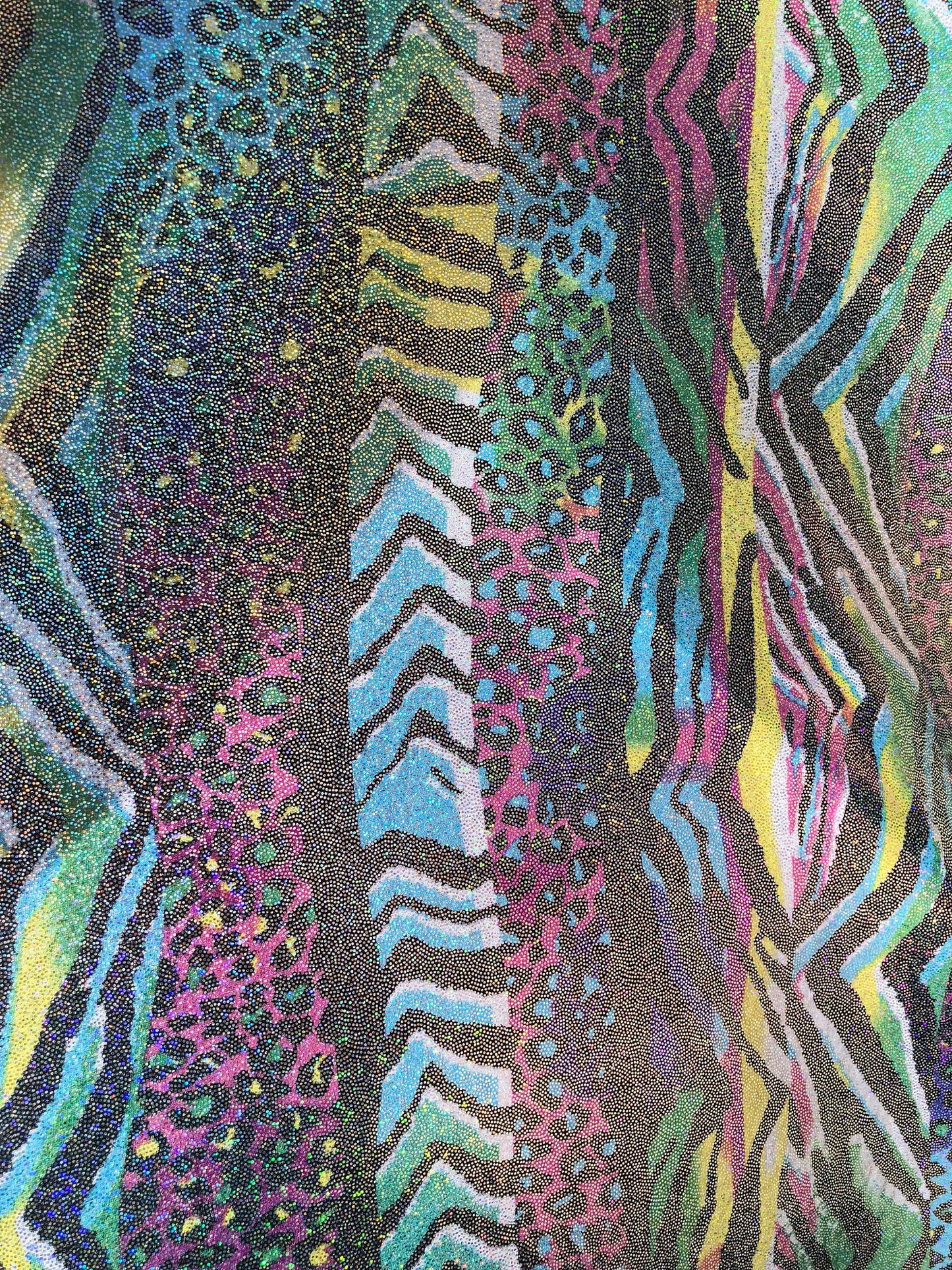 New metallic spandex multi animal print 4way stretch 58/60" Sold by the YD. Ships worldwide from Los Angeles California USA.