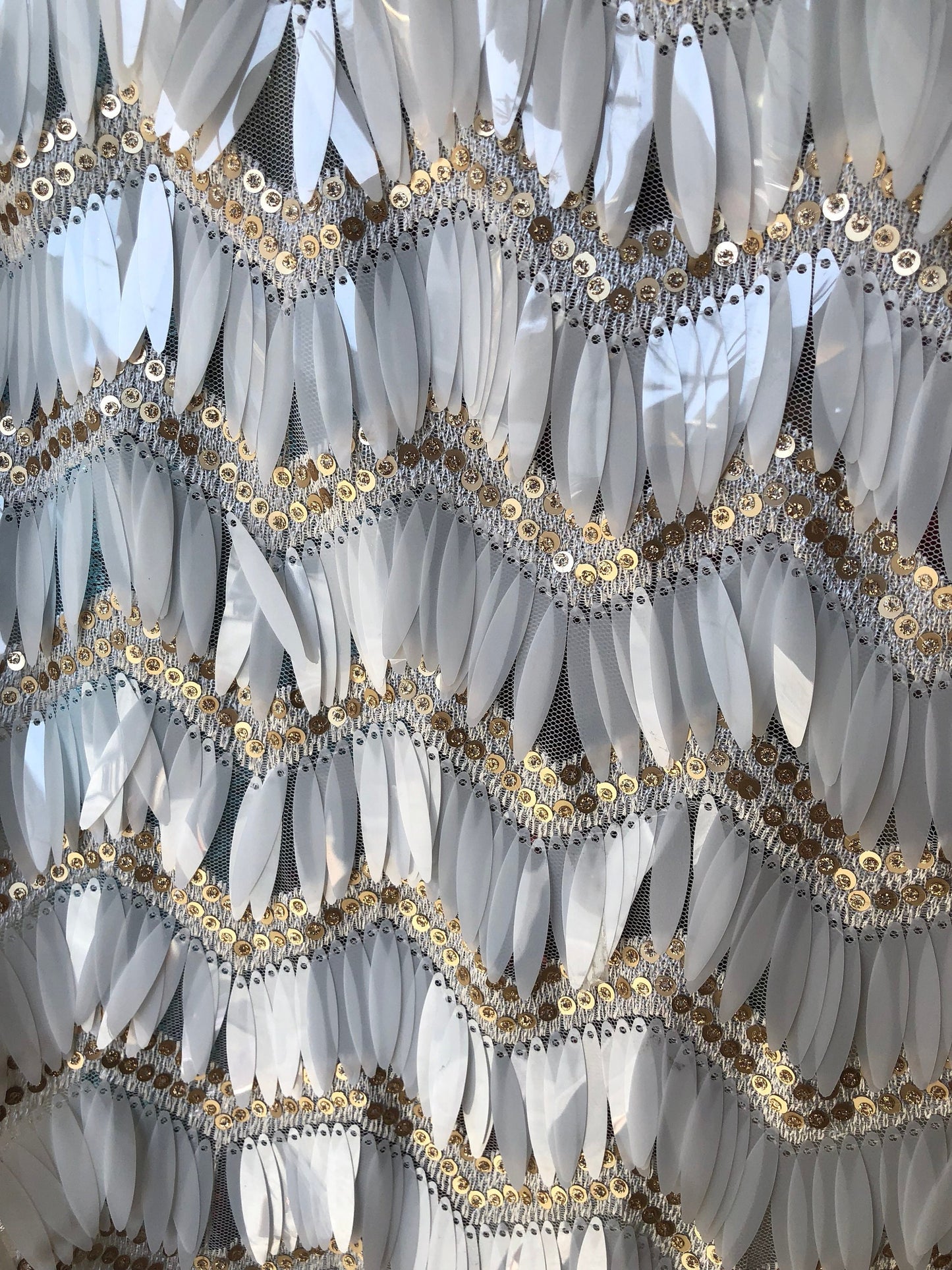 New sequins zig zag design on stretch mesh base 2way stretch 58/60" Sold by the YD. Ship worldwide from Los Angeles California USA.