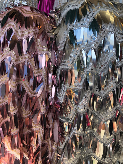 New sequins zig zag design on stretch mesh base 2way stretch 58/60" Sold by the YD. Ship worldwide from Los Angeles California USA.