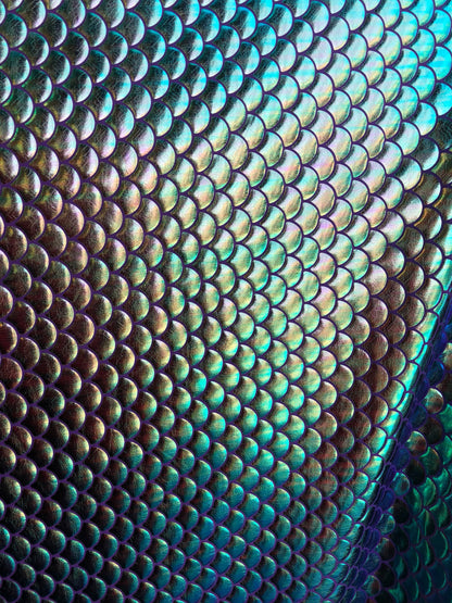 New mermaid design iridescent purple green fish scales foil 4way Stretch 58/60" Sold by the YD. Ships Worldwide from Los Angeles California.