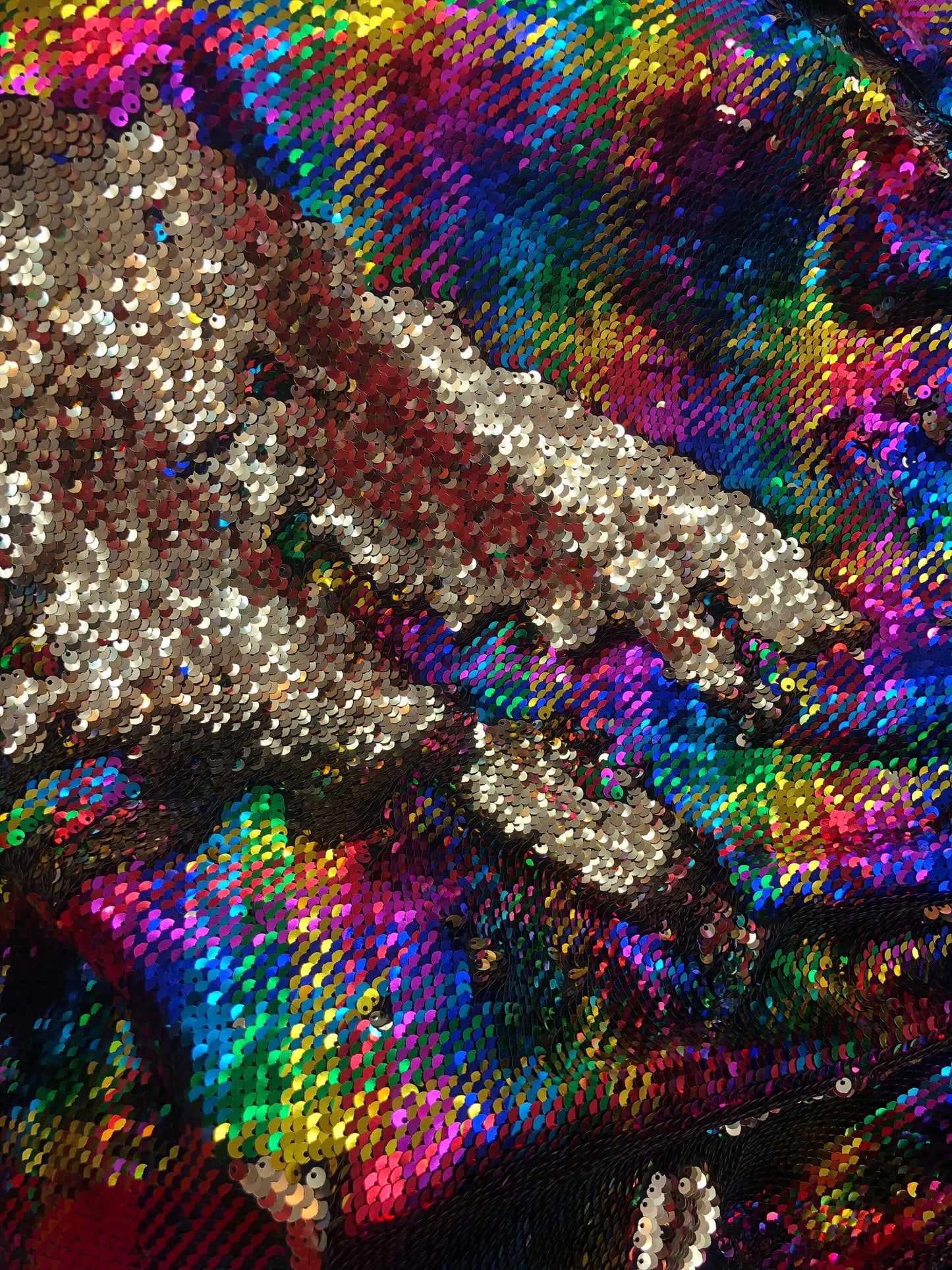 New hologram rainbow/gold reversible sequins on spandex base 2way Stretch 58/60" Sold by the YD. Ships worldwide from Los Angeles CA USA.