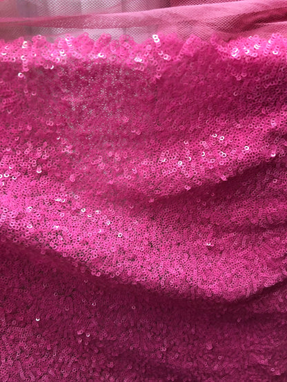 New mini glitz sequins on stretch mesh bubblegum pink 2way stretch 55/57" Sold by the YD. Ships worldwide from Los Angeles California USA.