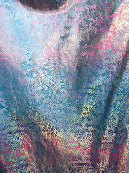 New metallic nylon spandex tie dye iridescent snake foil 4way stretch 58/60" Sold by the YD. Ships worldwide from Los Angeles California USA