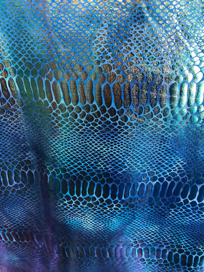 New iridescent metallic nylon spandex dragon design 4way stretch 58/60" Sold by the YD. Ships worldwide from Los Angeles California USA.