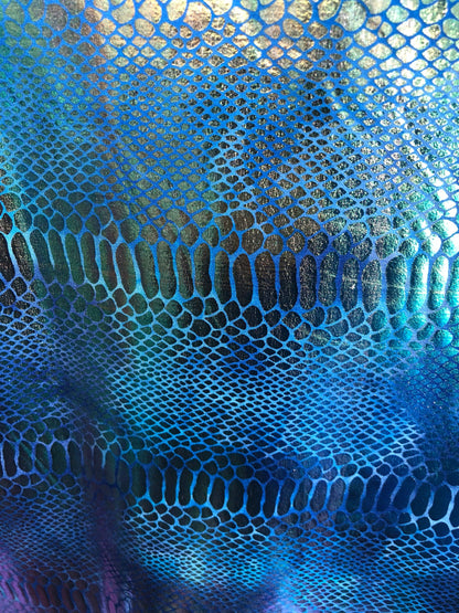 New iridescent metallic nylon spandex dragon design 4way stretch 58/60" Sold by the YD. Ships worldwide from Los Angeles California USA.