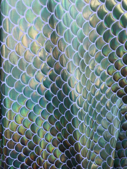 New mermaid fish scale iridescent olive green foil on nylon spandex 4way Stretch 58/60" Sold by the YD. Ships worldwide from Los Angeles CA.