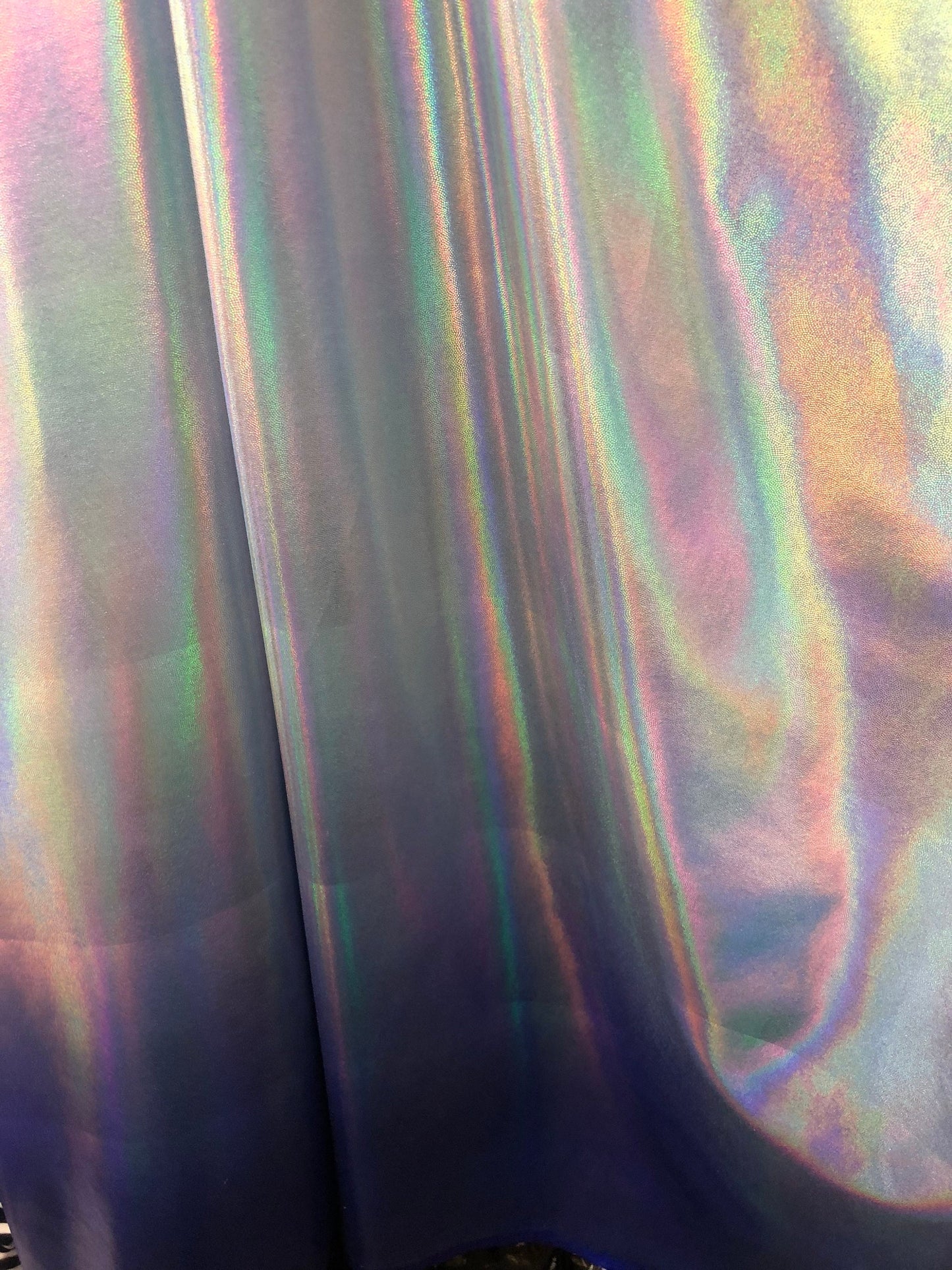 New iridescent metallic Ombré design two tone hologram foil 4way stretch 58/60" Sold by the YD. Ships worldwide from Los Angeles CA USA.