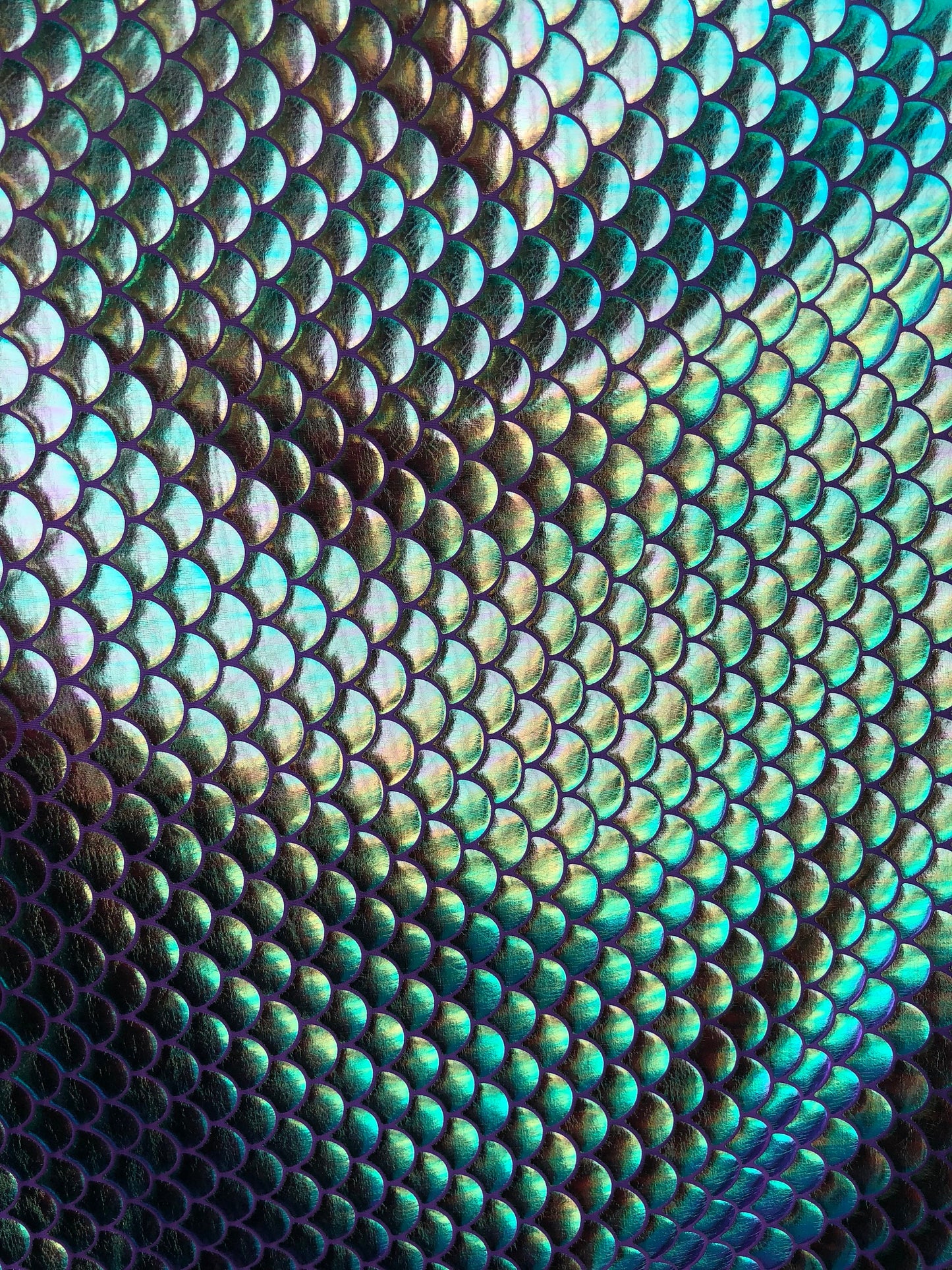 New mermaid design iridescent purple green fish scales foil 4way Stretch 58/60" Sold by the YD. Ships Worldwide from Los Angeles California.