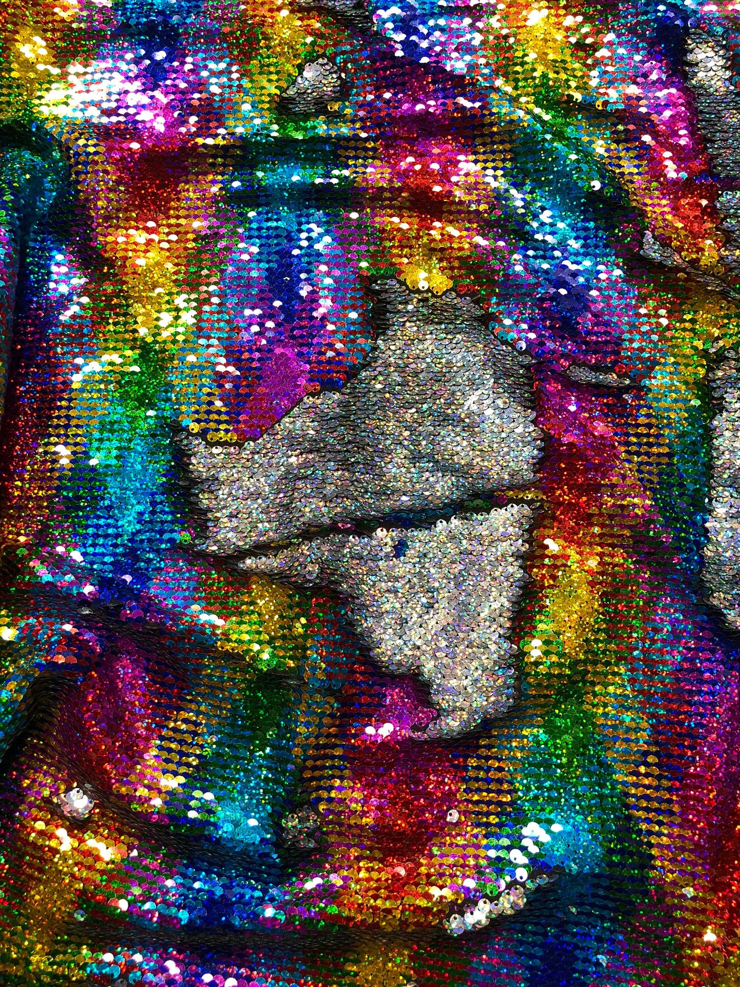 New rainbow sequins mermaid reversible sequins rainbow/silver on spandex base 58/60" Sold by the YD. Ships Worldwide from Los Angeles CA USA