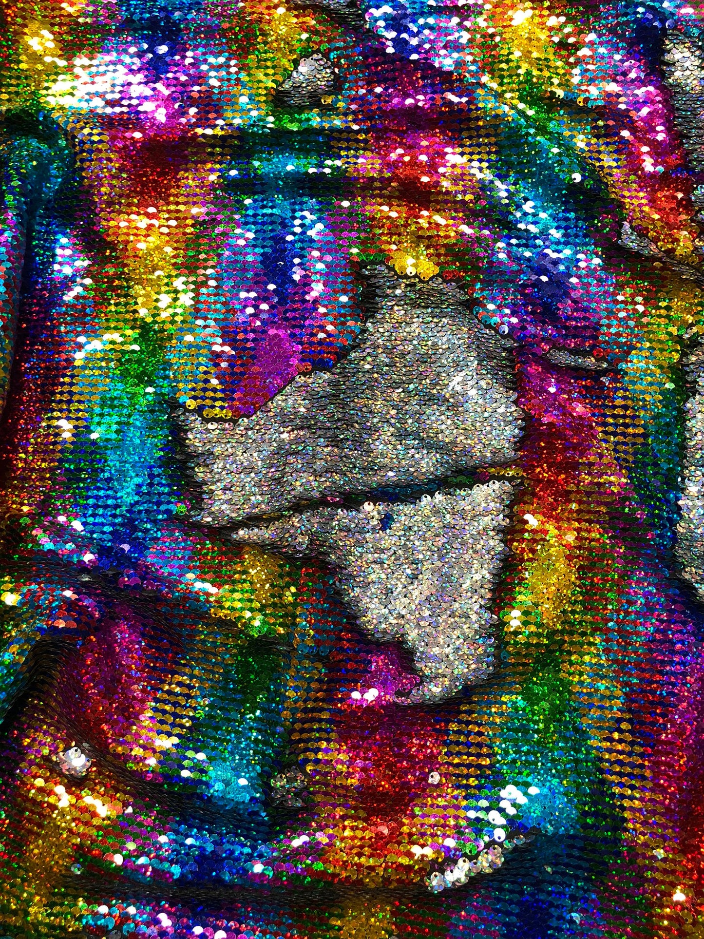 New rainbow sequins mermaid reversible sequins rainbow/silver on spandex base 58/60" Sold by the YD. Ships Worldwide from Los Angeles CA USA