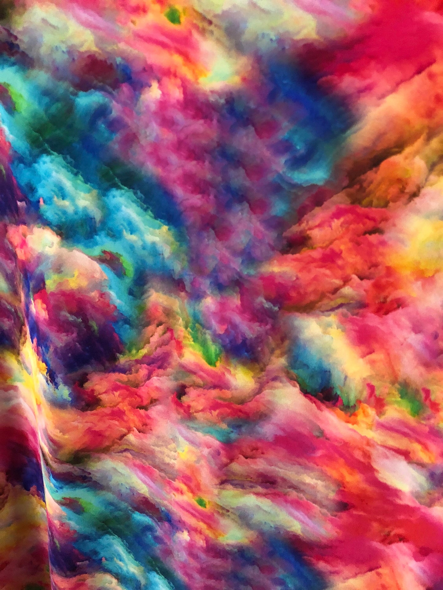 New tie dye heavy print nylon spandex multicolor 4way stretch 58/60" Sold by the YD. Ships worldwide from Los Angeles California USA.