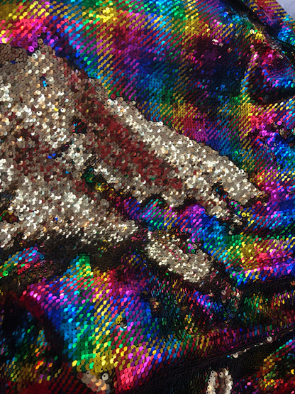 New hologram rainbow/gold reversible sequins on spandex base 2way Stretch 58/60" Sold by the YD. Ships worldwide from Los Angeles CA USA.