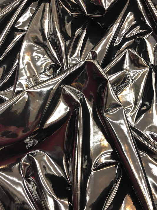 Shining black latex vinyl 4way stretch 58/60" Sold by the YD. Ships worldwide from Los Angeles California USA.