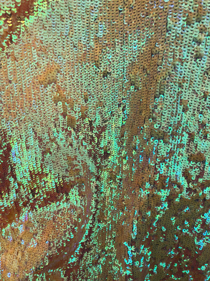 New sequins iridescent orange coral on stretch mesh 2way 58/60" Sold by the YD. Ships worldwide from Los Angeles California USA.