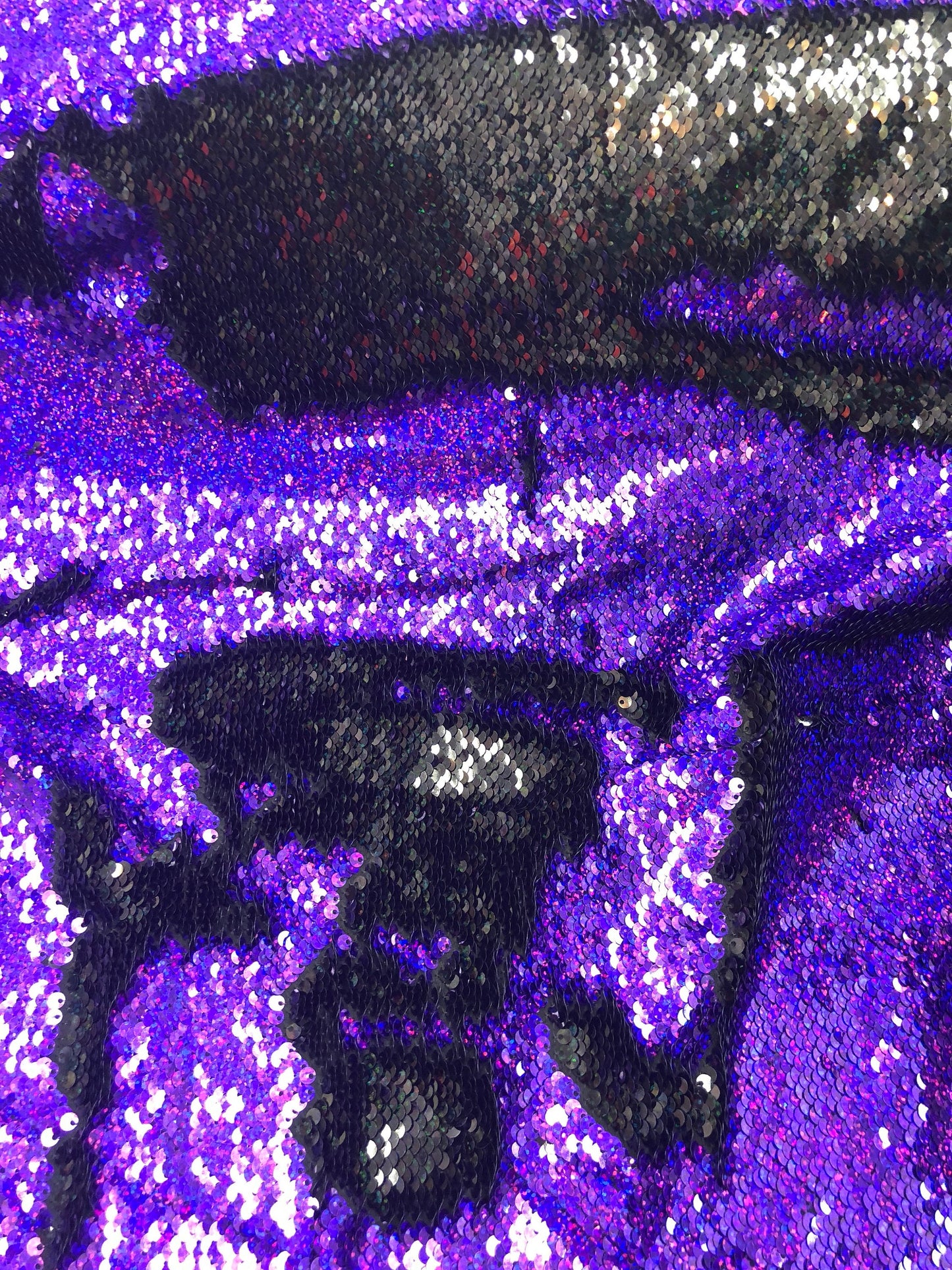 New flip up hologram sequins black/purple reversible sequins in spandex base 2way 58/60" Sold by the YD. Ships worldwide from L.A CA