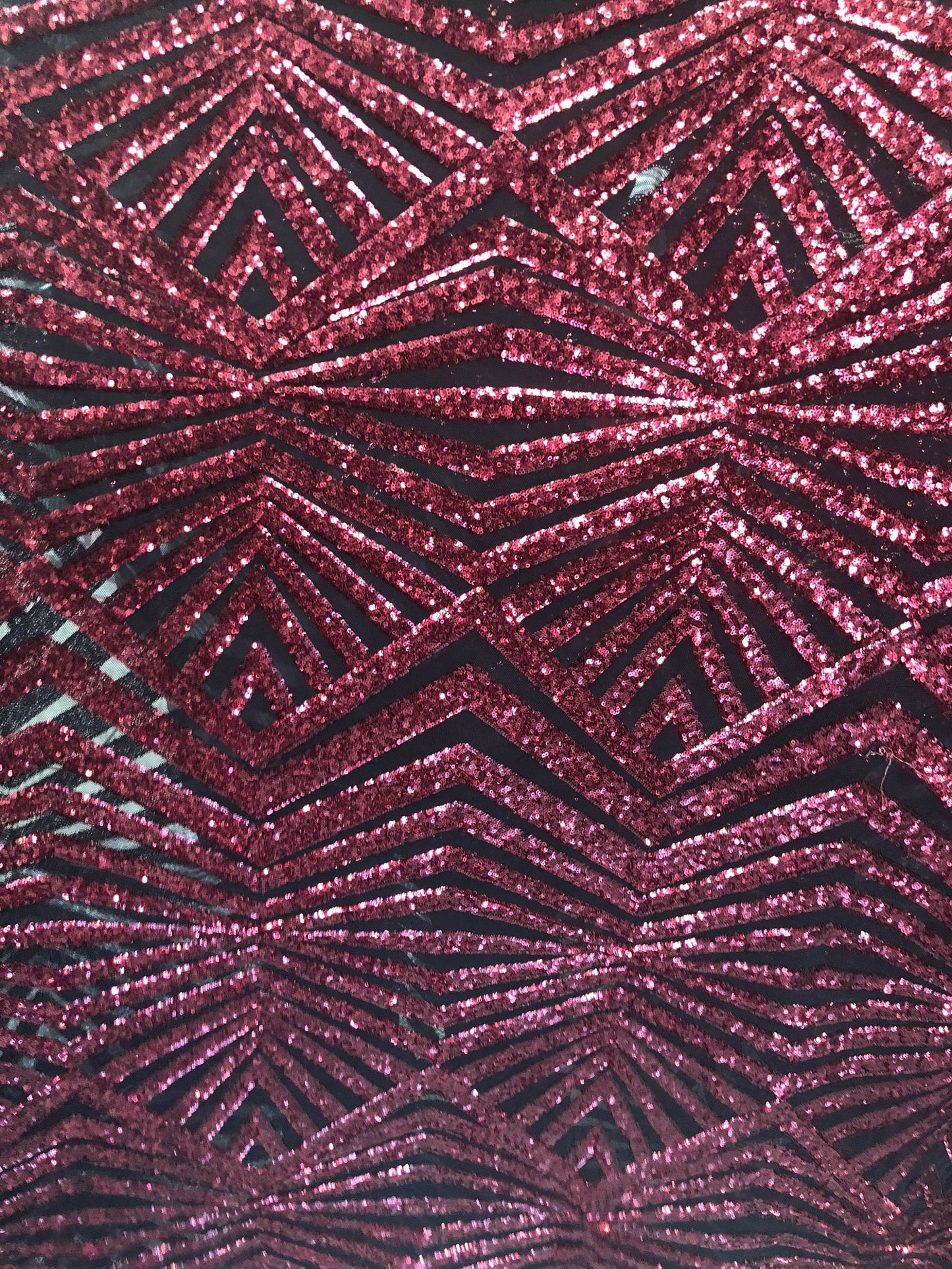 Jennifer mini glitz sequins on stretch power mesh base 2way stretch 58/60" Sold by the YD. Ships worldwide from Los Ángeles California USA.