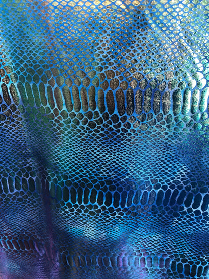 New iridescent metallic nylon spandex dragon design 4way stretch 58/60" Sold by the YD. Ships worldwide from Los Angeles California USA.