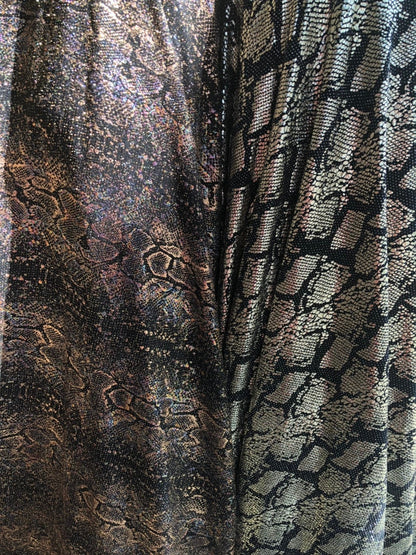 New iridescent snake design foil on slinky spandex 4way stretch 58/60" Sold by the YD. Ships worldwide from Los Angeles California USA.