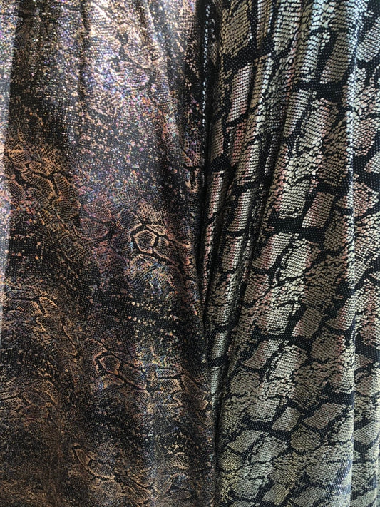 New iridescent snake design foil on slinky spandex 4way stretch 58/60" Sold by the YD. Ships worldwide from Los Angeles California USA.