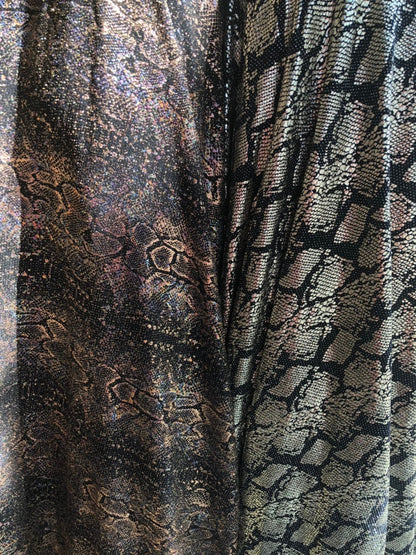New iridescent snake design foil on slinky spandex 4way stretch 58/60" Sold by the YD. Ships worldwide from Los Angeles California USA.