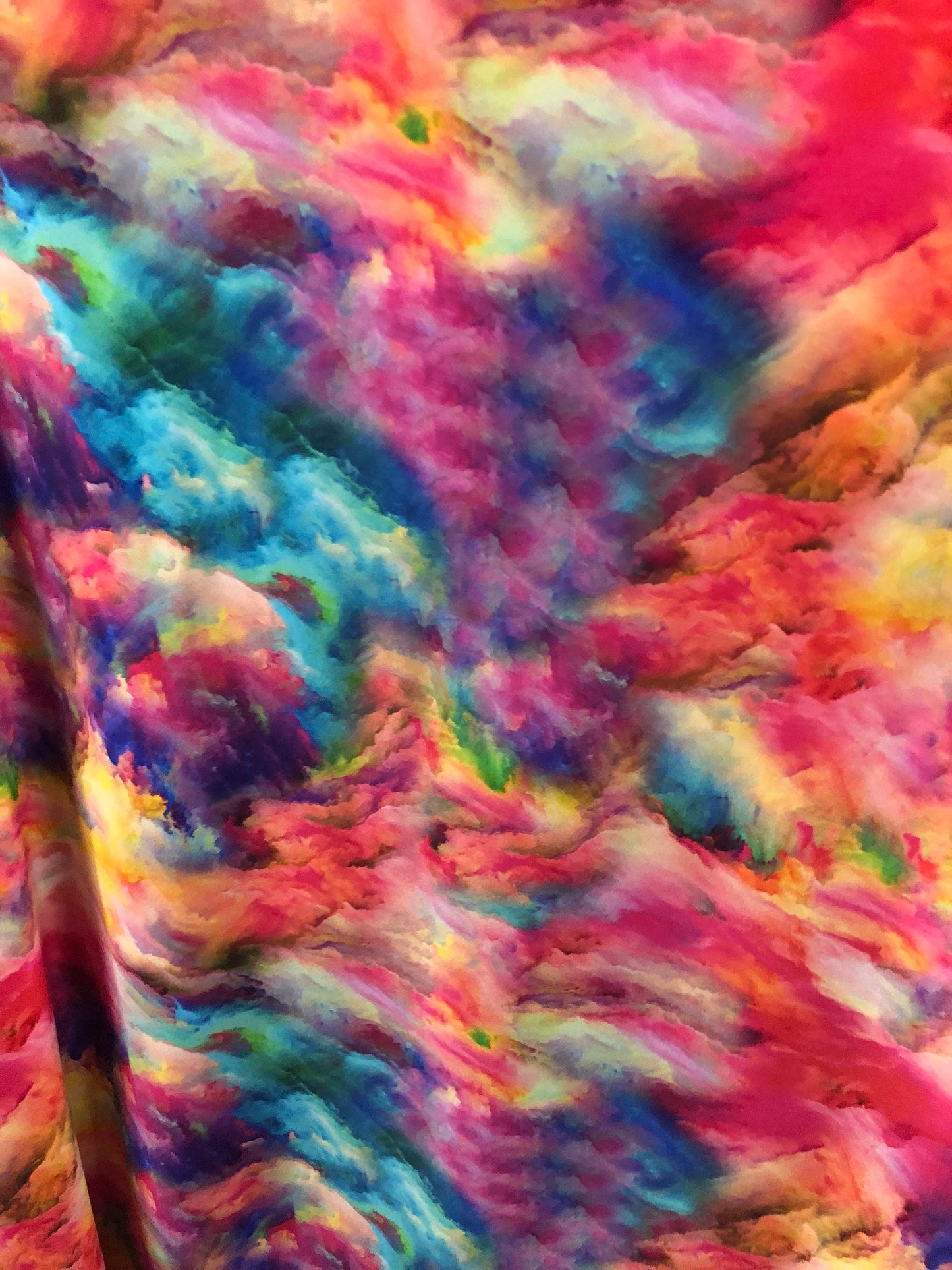 New tie dye heavy print nylon spandex multicolor 4way stretch 58/60" Sold by the YD. Ships worldwide from Los Angeles California USA.