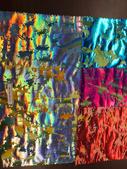 Lava print with iridescent foil on nylon spandex  4way stretch 58/60" Sold by the YD. Ships worldwide from Los Angeles California USA.
