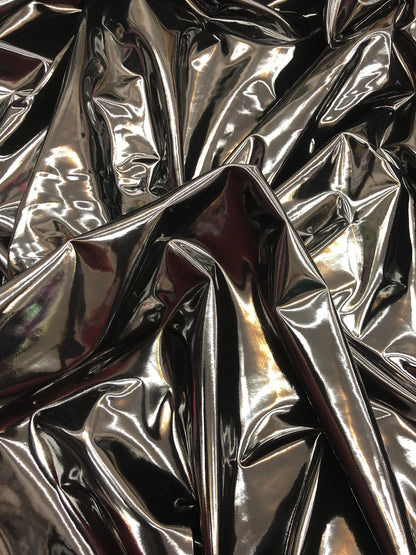 Shining black latex vinyl 4way stretch 58/60" Sold by the YD. Ships worldwide from Los Angeles California USA.
