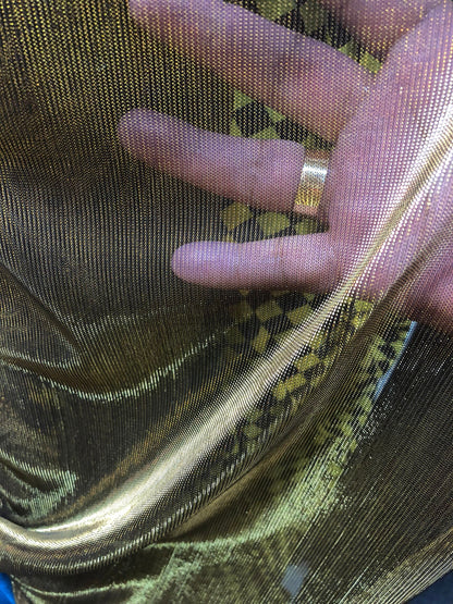 Metallic mesh black gold 4way stretch 58/60" Sold by the YD. Ships worldwide from Los Angeles California USA.