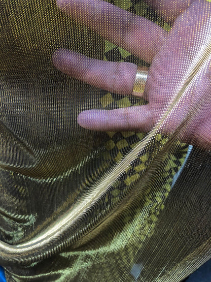Metallic mesh black gold 4way stretch 58/60" Sold by the YD. Ships worldwide from Los Angeles California USA.