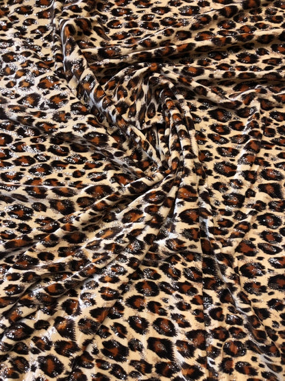 Leopard design with gold glitter print on velvet 420gsm 4way stretch 58/60" Sold by the YD. Ships worldwide from Los Angeles California USA.