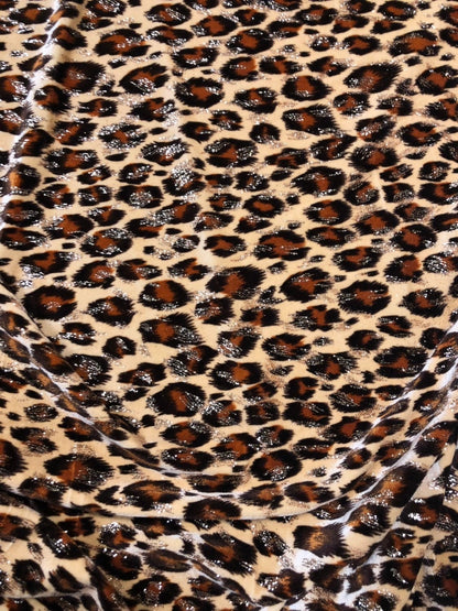 Leopard design with gold glitter print on velvet 420gsm 4way stretch 58/60" Sold by the YD. Ships worldwide from Los Angeles California USA.