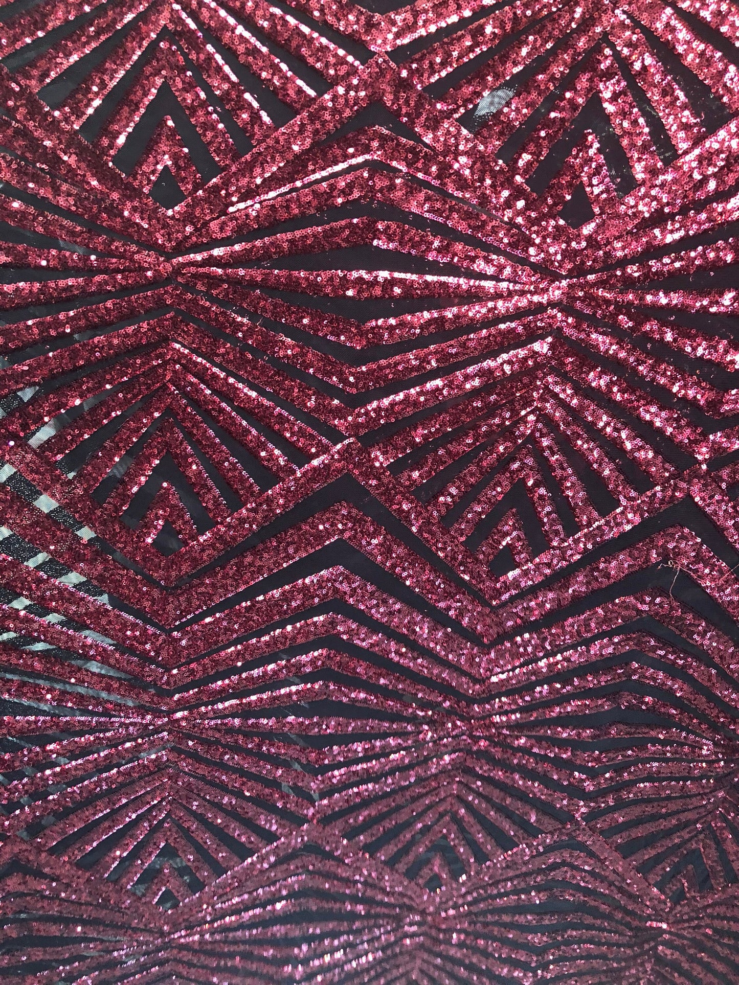 Jennifer mini glitz sequins on stretch power mesh base 2way stretch 58/60" Sold by the YD. Ships worldwide from Los Ángeles California USA.