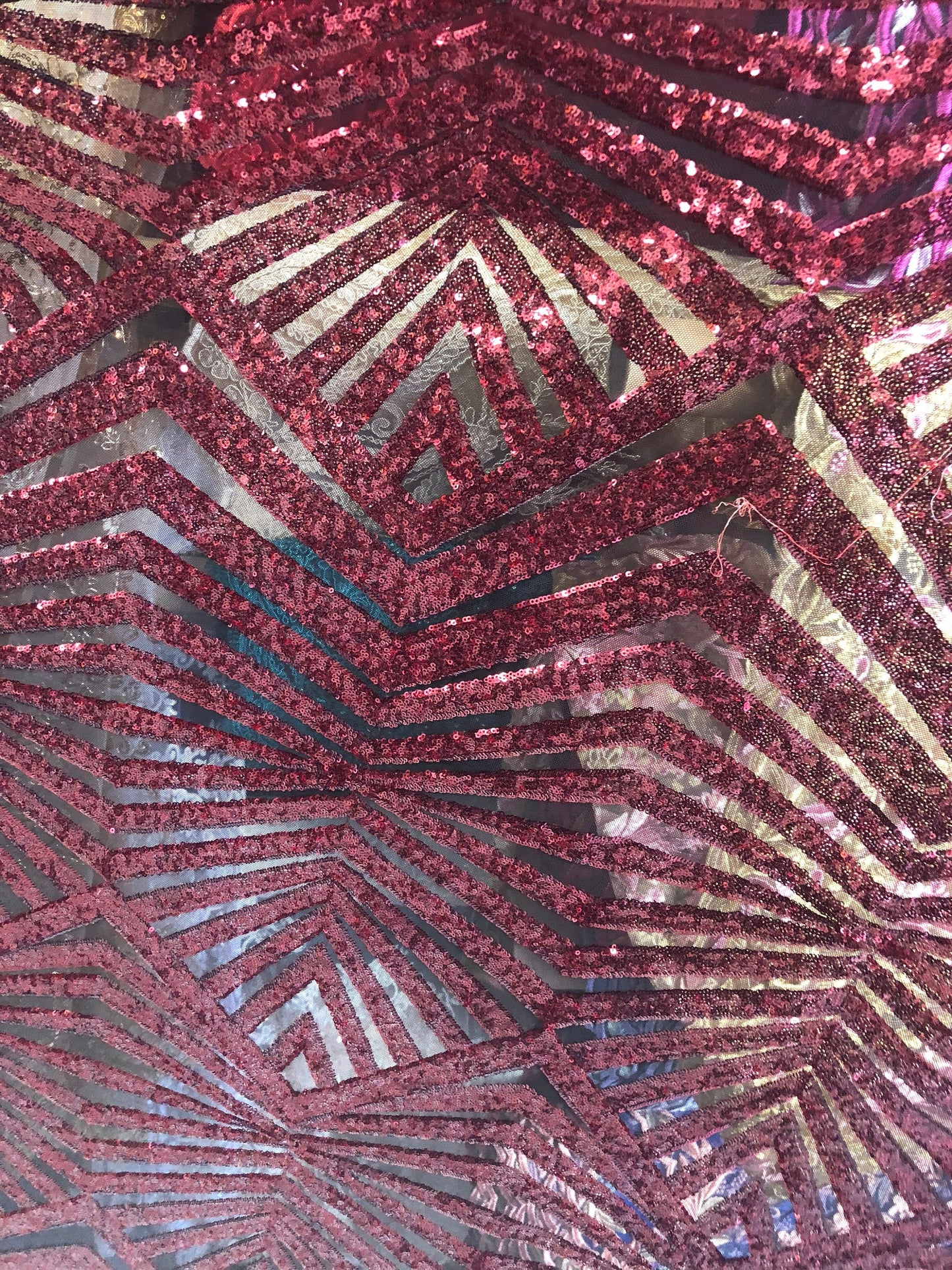 Jennifer mini glitz sequins on stretch power mesh base 2way stretch 58/60" Sold by the YD. Ships worldwide from Los Ángeles California USA.
