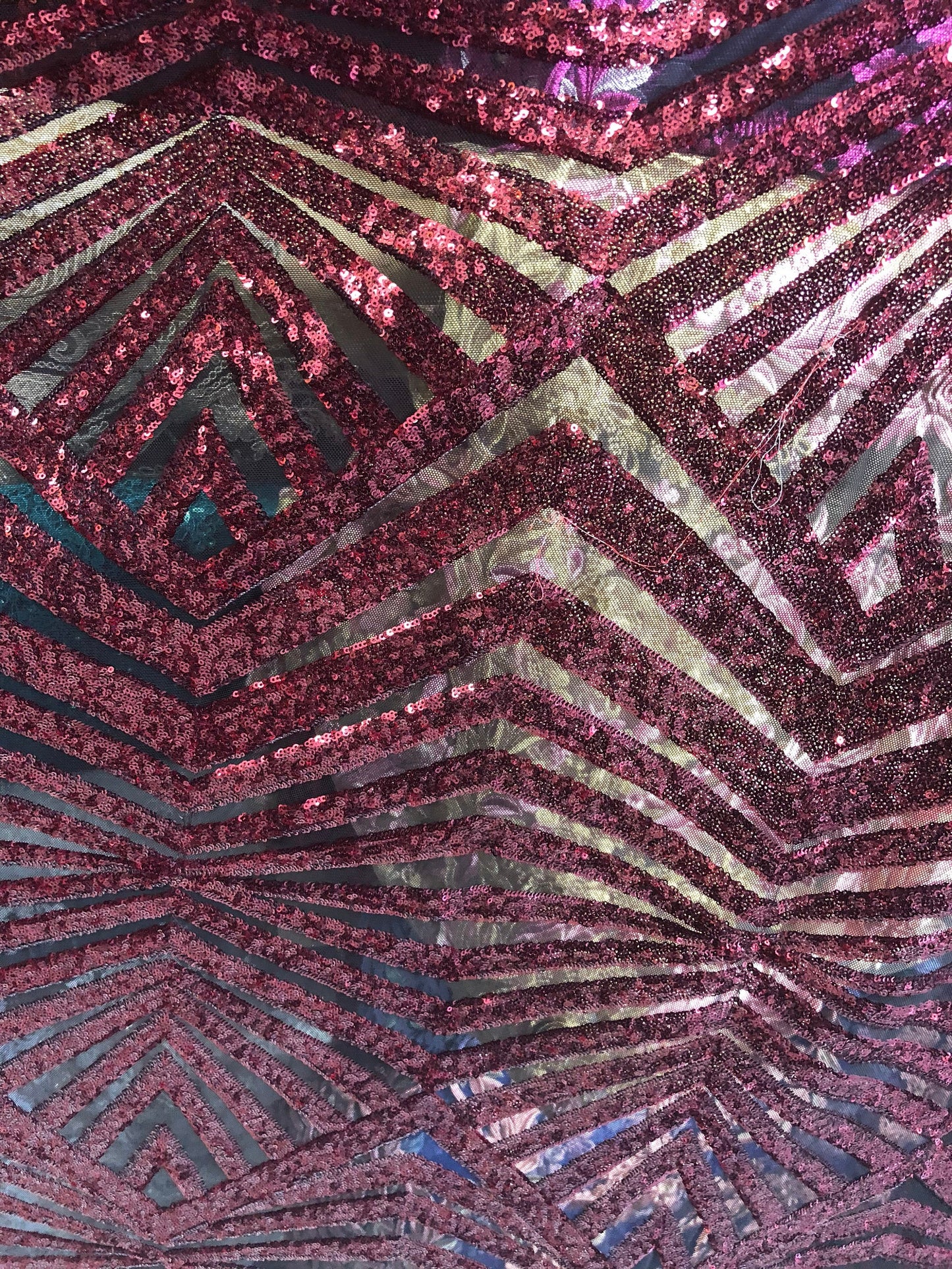Jennifer mini glitz sequins on stretch power mesh base 2way stretch 58/60" Sold by the YD. Ships worldwide from Los Ángeles California USA.