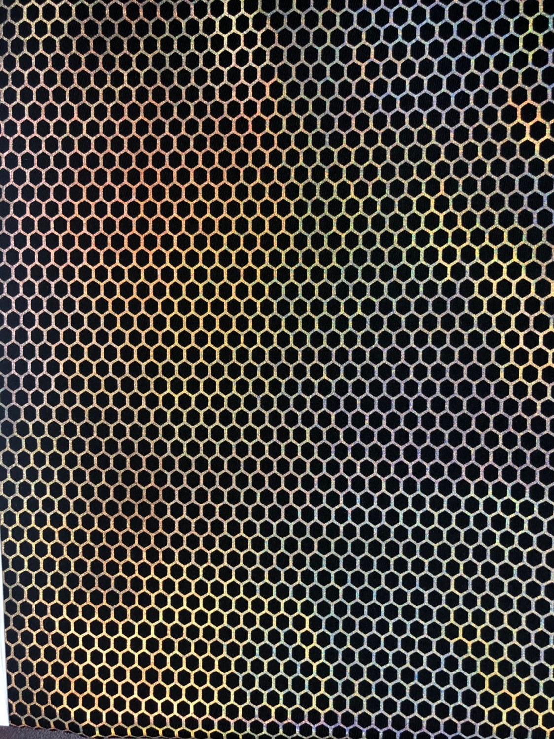 Honeycomb print hologram foil metallic nylon spandex 4way stretch 58/60" Sold by the YD. Ships worldwide from Los Angeles California USA