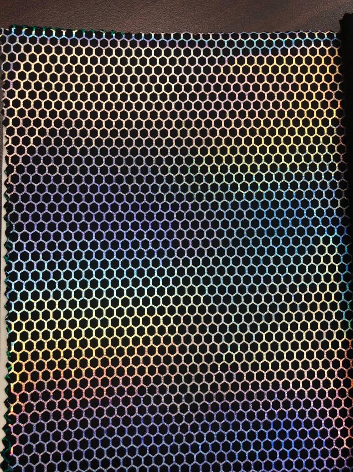 Honeycomb print hologram foil metallic nylon spandex 4way stretch 58/60" Sold by the YD. Ships worldwide from Los Angeles California USA