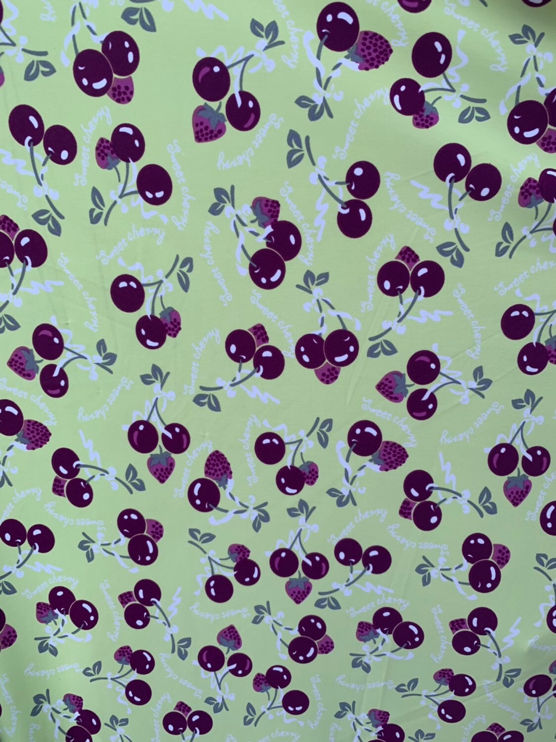 Sweet cherry design print on nylon spandex 4way stretch 58/60" Sold by the YD. Ships worldwide from Los Ángeles California USA.