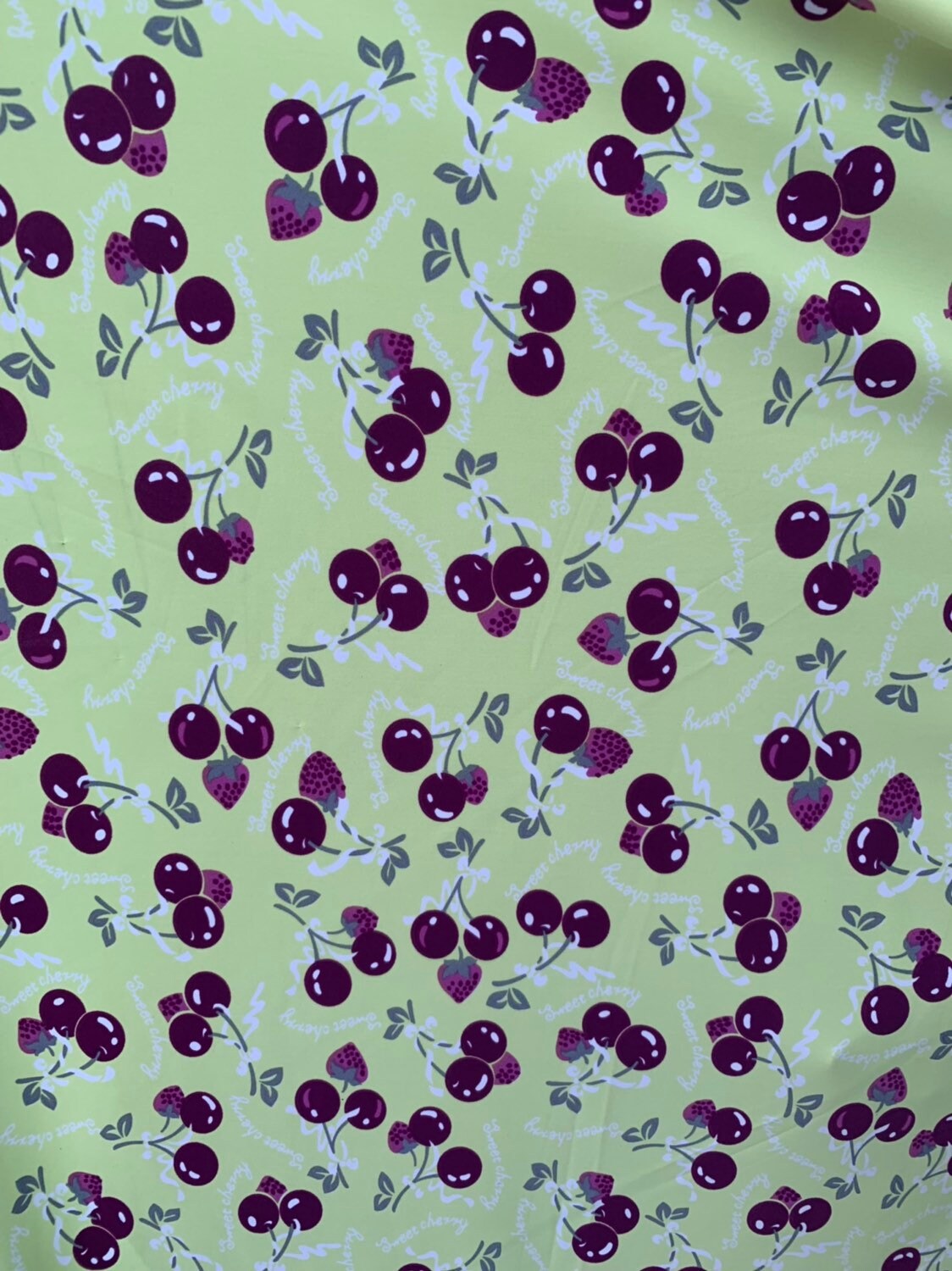 Sweet cherry design print on nylon spandex 4way stretch 58/60" Sold by the YD. Ships worldwide from Los Ángeles California USA.