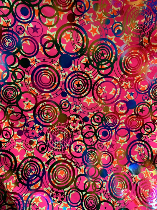 Stars  and circles hologram design metallic nylon spandex 4way 58/60" Sold nubthe YD. Ships worldwide from Los Angeles California USA.