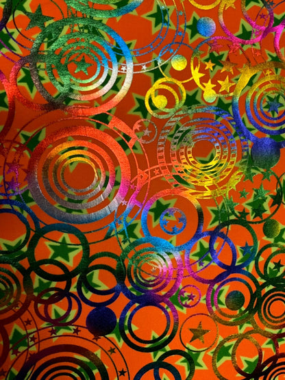 Stars  and circles hologram design metallic nylon spandex 4way 58/60" Sold nubthe YD. Ships worldwide from Los Angeles California USA.