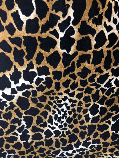 Giraffe design print on good quality stretch velvet 4way 58/60" Sold by the YD. Ships worldwide from Los Angeles California USA.